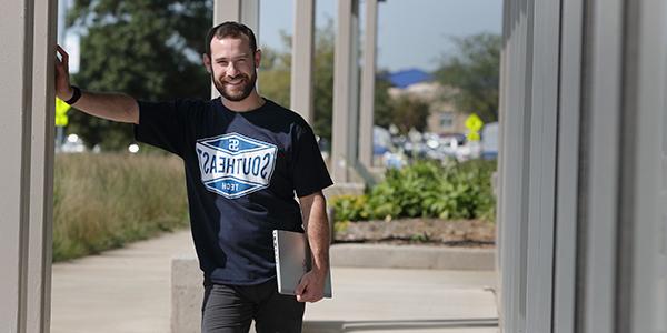 Student outside the HUB